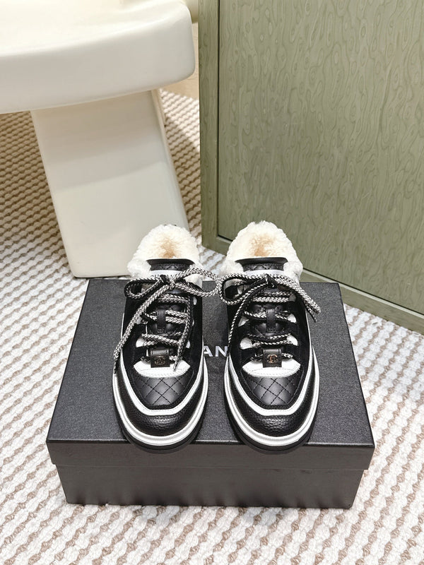 Chanel 26s Thick-Sole Sneakers In Black And White Calfskin With Fur Lining
