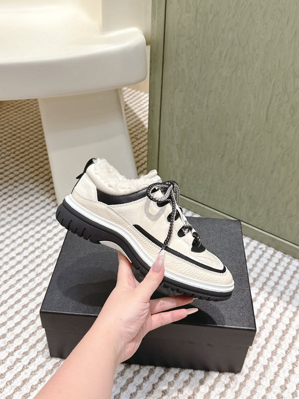 Chanel 26s Thick-Sole Sneakers In White And Black Calfskin With Fur Lining