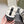 Chanel 26s Thick-Sole Sneakers In White And Black Calfskin With Fur Lining