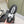 Chanel 26s Thick-Sole Sneakers In White And Black Calfskin With Fur Lining