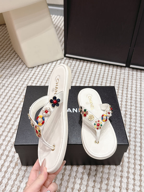 Mules CC 26s en peau de mouton blanche 632363