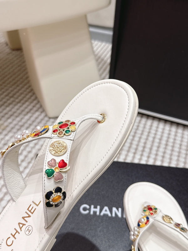 Mules CC 26s en peau de mouton blanche 632363