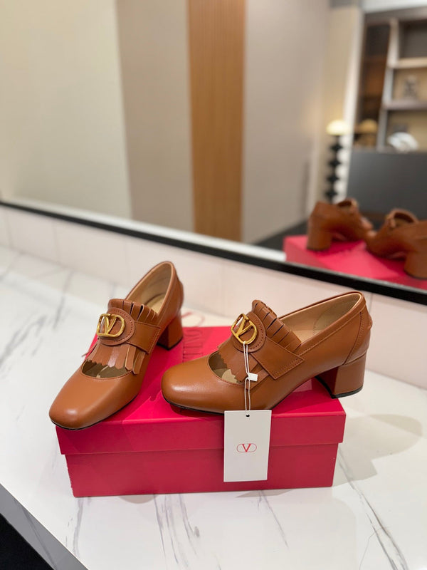 Mocassino con tacco VT 2025 Signature in pelle di vitello marrone 295069