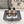 ALAIA MARY JANE FLATS white mix black woven calfskin pattent
