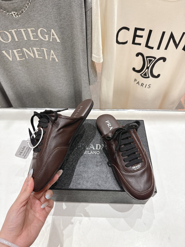 Prada 25s mule dark brown sheepskin 535501