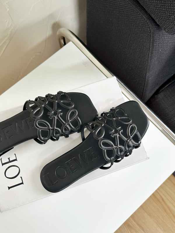 Petal Anagram Slide in Black Soft Calfskin 273512