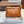 LOE POUCH CLUTCH BAG 30 IN WARM DESSERT CALFSKIN
