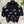 Polo Chanel 2026 en coton noir et blanc à imprimé floral