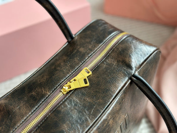 BORSA BEAU 34 IN PELLE DI VITELLO SABBIA/CAFFÈ