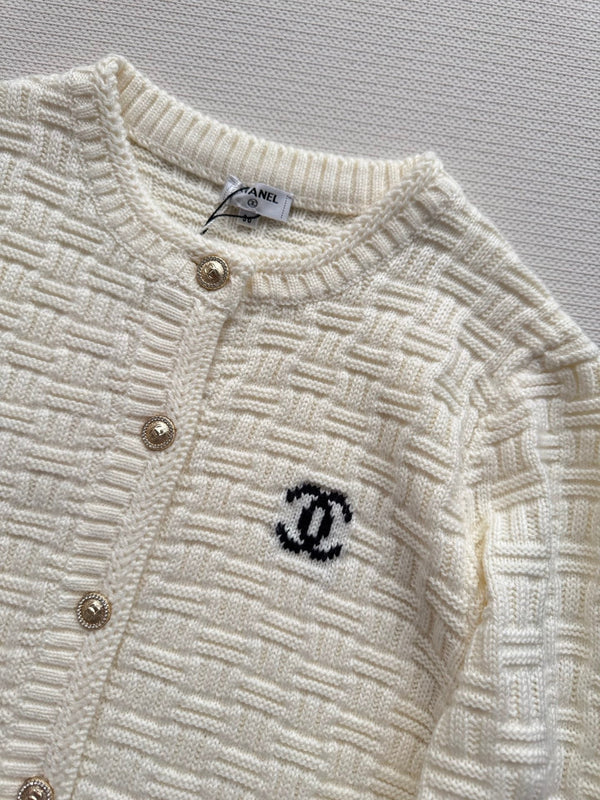 Chanel Cardigan en maille avec logo double C en laine crème 2025