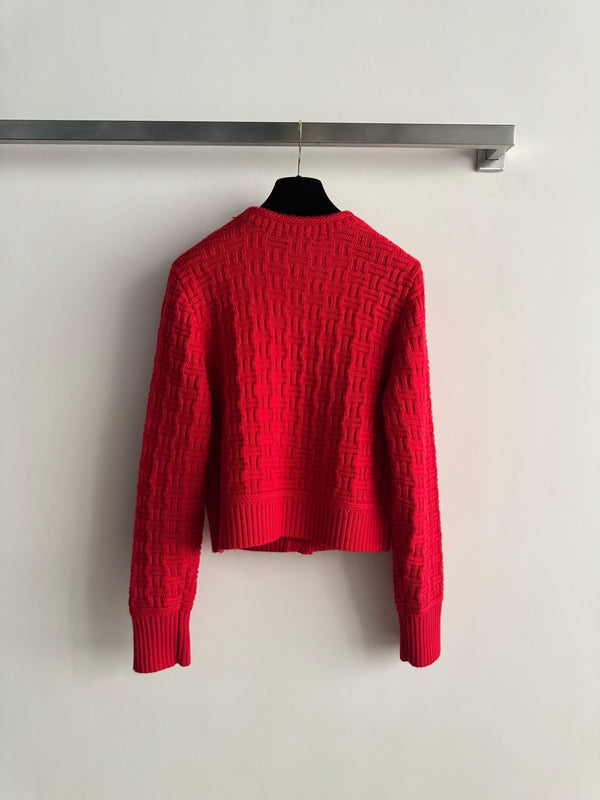 Cardigan en maille de laine rouge Chanel 2025 avec logo double C