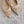 HIGH SLINGBACKS 65 MM IN BEIGE CREAM PATENT CALFSKIN