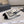 CC Cap Toe Slingback Black White Lambskin 404284