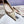 ROCKSTUD FLAT PUMP IN SAND BROWN CALFSKIN