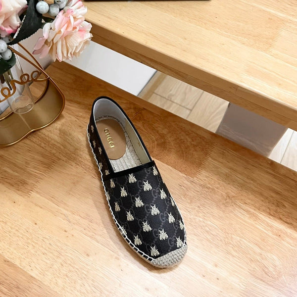 Scarpe basse GG Supreme nere Caro