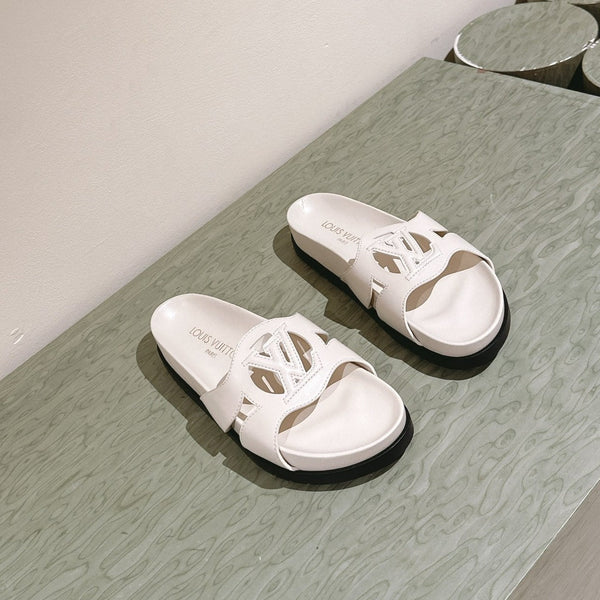 lv sandal isola flat mule cream calfskin