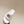 RISE SANDALS IN WHITE SHINY LAMBSKIN GOLD BUCKLE