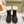 ANKLE BOOTS IN BLACK EMBOSSED CALFSKIN AND WHITE SHEARLING