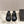 Alaia 2025 Vienne Cutout Kitten-Heel Slide Sandals Black Leather 293648