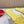 Petal Anagram Slide in Yellow Soft Calfskin 273742