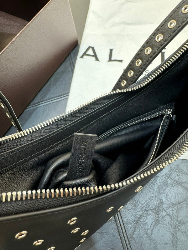 ONE PIECE DEMI LUNE BAG 31 IN BLACK SHEEPSKIN EYELET DETAILING