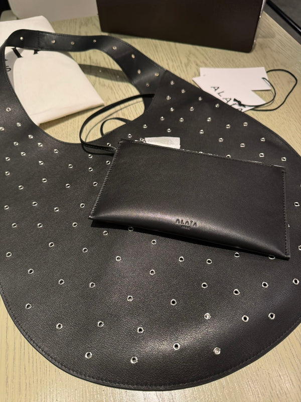 ONE PIECE MEDIUM BAG 39 IN BLACK SHEEPSKIN EYELET DETAILING