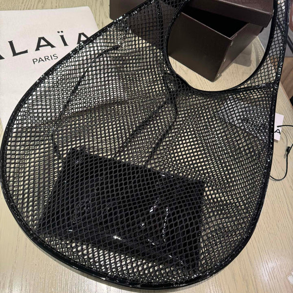 ONE PIECE MEDIUM BAG 43 IN BLACK FISHNET