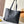 LOW KEY CABAS 47 IN BLACK GRAINED CALFSKIN GOLD BUCKLE
