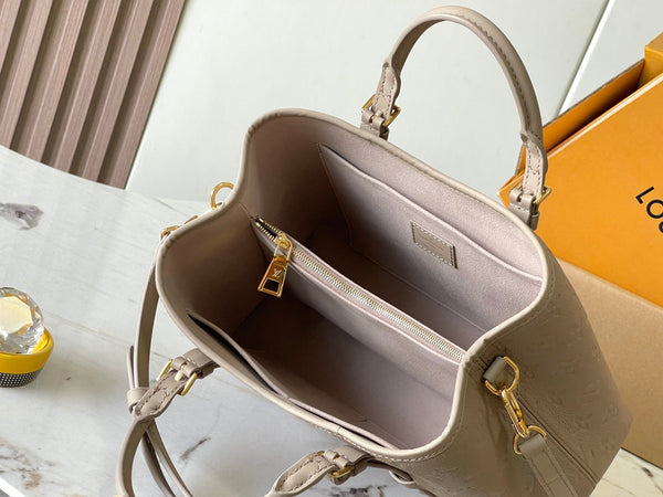 BORSA BABYLONE 31 IN PELLE EMPREINTE MONOGRAM TOURTERELLE
