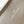 NEVERFULL BANDOULIÈRE INSIDE OUT BB 24 IN BROWN MONOGRAM CANVAS AND GRAY CALFSKIN