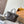 NEVERFULL BANDOULIÈRE INSIDE OUT BB 24 IN BROWN MONOGRAM CANVAS AND GRAY CALFSKIN
