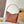 CARRYALL PM 29 IN COGNAC MONOGRAM EMPREINTE LEATHER GOLD LOGO