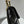 Mini borsa con patta 17 cm in pelle di agnello nera con finiture dorate 