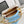 CAPUCINES BB 27 IN PEARL WHITE MIX SKY BLUE TAURILLON GOLD HARDWARE