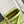 CAPUCINES MINI 21 IN PEAR GREEN TAURILLON GOLD HARDWARE