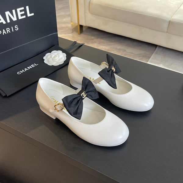 BALLET FLAT IN PELLE DI AGNELLO BIANCA CON FIOCCO NERO