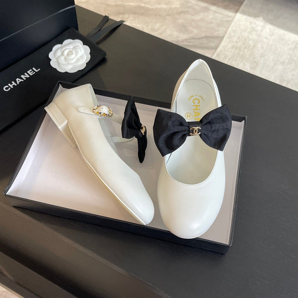 BALLET FLAT IN PELLE DI AGNELLO BIANCA CON FIOCCO NERO