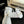 FLAT SANDALS IN WHITE LAMBSKIN WITH GOLD CHAIN