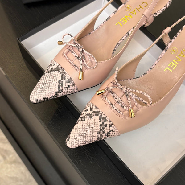 DÉCOLLETÉ CON TACCO ALTO 65 MM IN ROSA CONFEZIONE CON MOTIVO SERPENTE IN PELLE DI AGNELLO