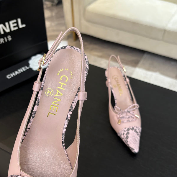 DÉCOLLETÉ CON TACCO ALTO 65 MM IN ROSA CONFEZIONE CON MOTIVO SERPENTE IN PELLE DI AGNELLO