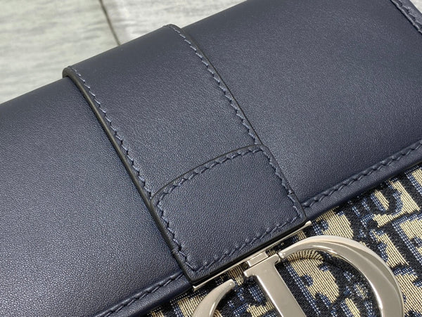 MONTAIGNE EAST-WEST 24 BAG WITH CHAIN IN NAVY BLUE LAMBSKIN AND MONOGRAM JACQUARD