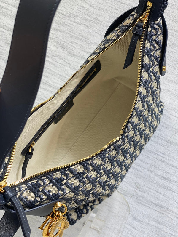 Sac Dior 2025 Voyage 28cm toile et cuir bleu marine/beige 270574