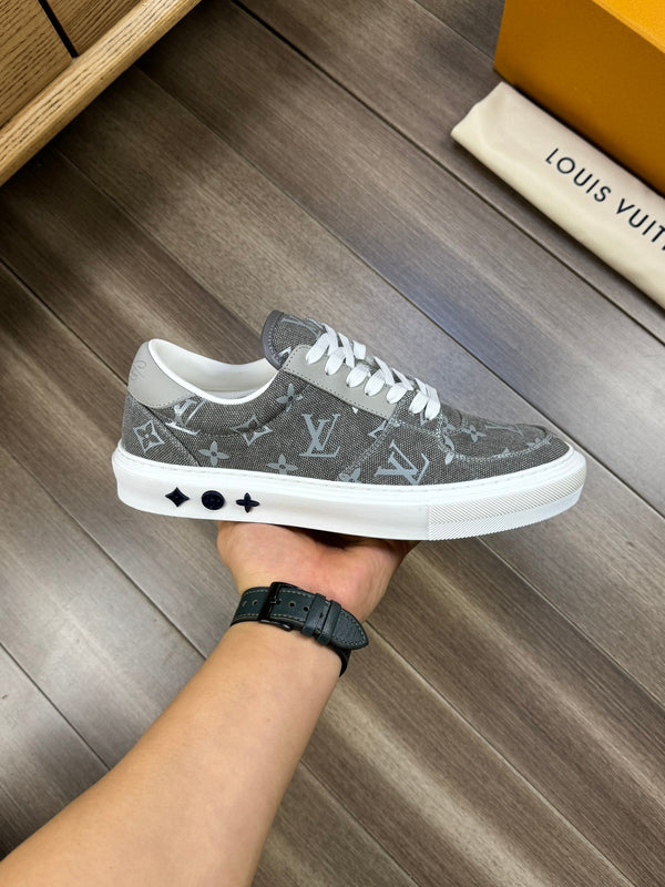 LV TRAINER SNEAKER IN GREY PASTEL MONOGRAM DENIM