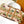 KEEPALL BANDOULIÈRE 50 IN SAND TROPICAL MOTIFS MONOGRAM SURFIN CANVAS