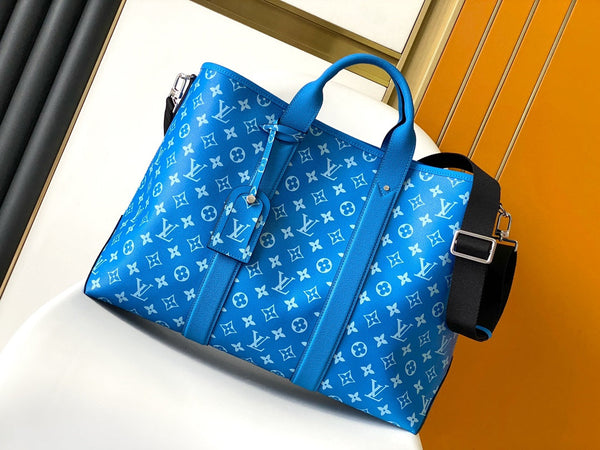 Borsa tote LV The Weekend 43 cm in tela monogramma blu e pelle Taïga 