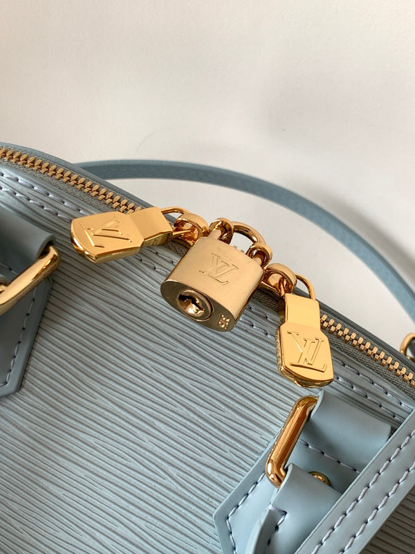 LV x TM Alma BB M13670 Handbag 23.5cm Light Blue Epi Grained Cowhide