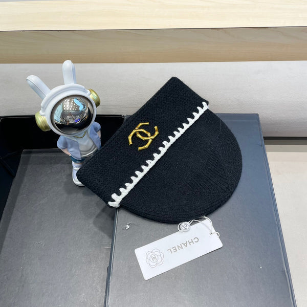CAPPELLO IN MAGLIA DI LANA NERA 424303 