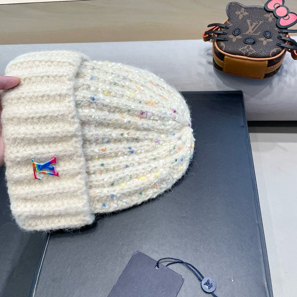 BERRETTO IN MAGLIA DI LANA BIANCA 431620
