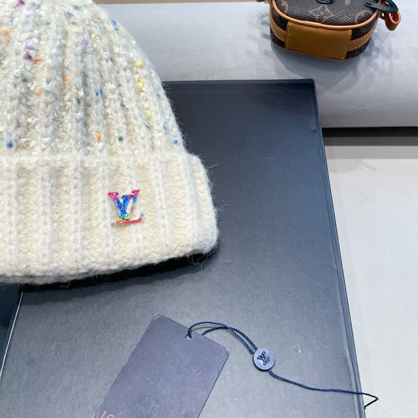 BERRETTO IN MAGLIA DI LANA BIANCA 431620