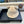 CAPPELLO A SECCHIELLO IN LANA BEIGE E PELLICCIA DI AGNELLO 434942 
